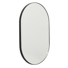 Capsula Capsule shaped Modern Customisable Mirror with Patina Frame, Medium