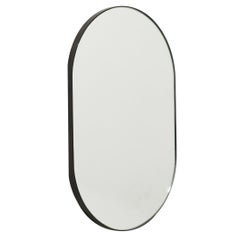 Capsula™ Capsule shaped Customisable Mirror with Patina Frame, Oversized