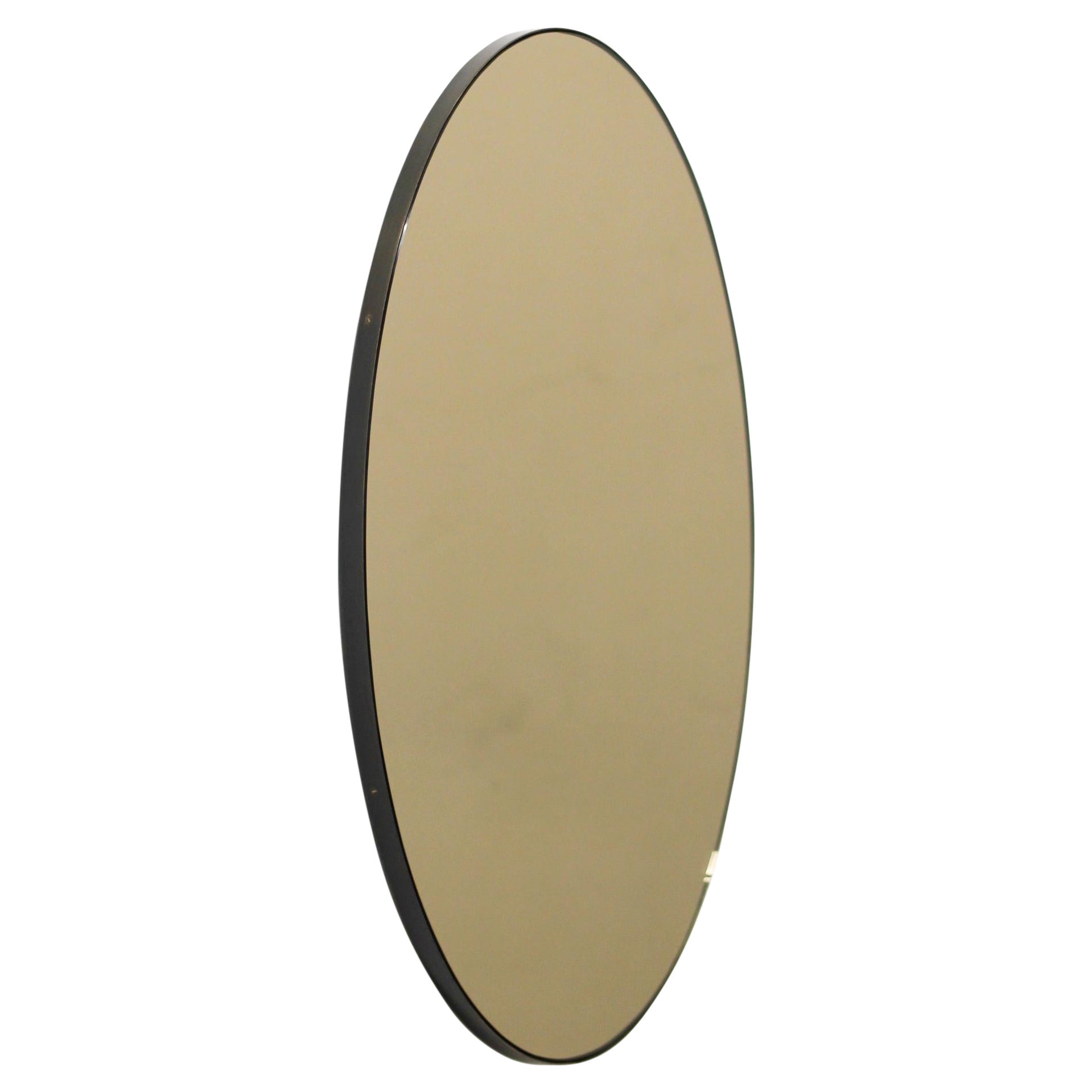 Miroir contemporain Ovalis ovale teinté bronze avec cadre patiné, moyen en vente