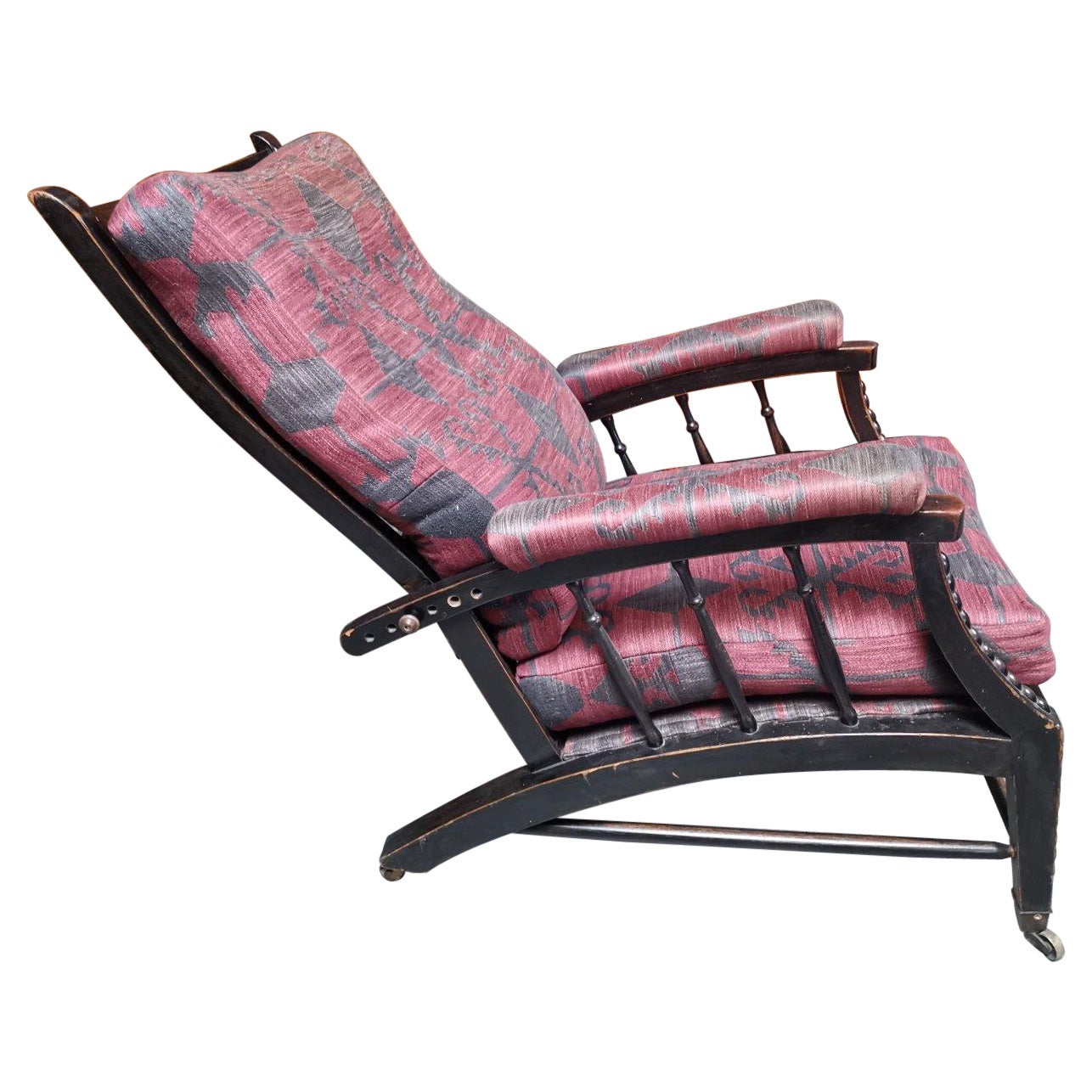 Phillip Webb for Morris & Co. an English Aesthetic Movement Reclining Armchair
