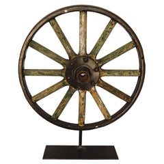 Antique Painted Iron Wheel on Stand