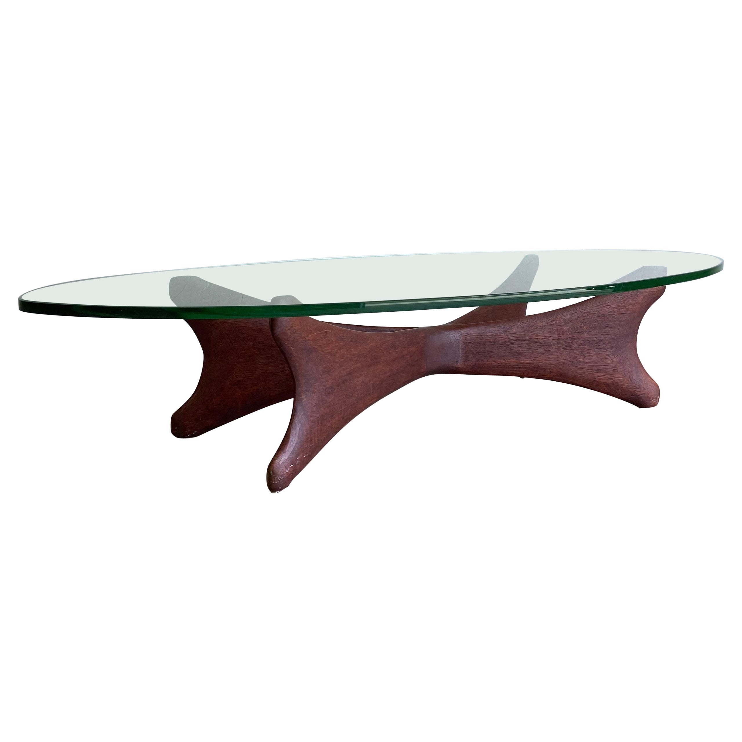 Offered is an incredible, one of kind studio craft coffee table in solid teak. Featuring an organic, sculpted form reminiscent of free-form designs of Noguchi. The table is well-executed and most certainly came from the hands of a skilled