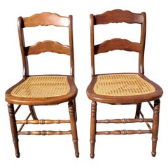 Antique Late 19th Century Americana Cane Seat and Ladder Back Chairs, a Pair