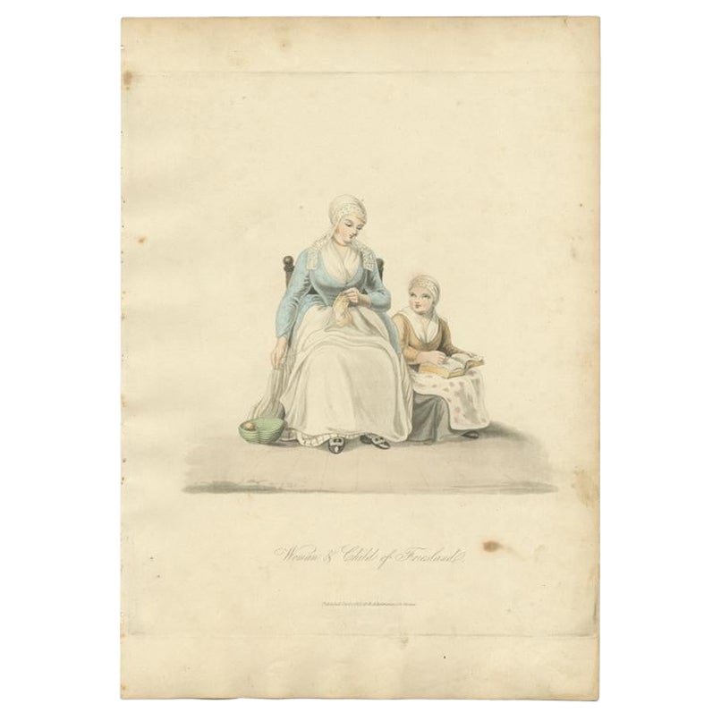 Antique costume print titled 'Woman & Child of Friesland'. Old costume print depicting a woman and child of the Dutch province 'Friesland'. This print originates from 'The Costume of the Netherlands displayed in thirty coloured engravings'.