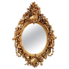 Miroir ovale en bois doré attribué à L. Frullini, Italie, vers 1890