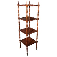 Antique English Regency Mahogany Four Tiered Finial Etagere with Brass Casters, C. 1800