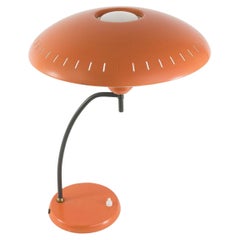 Lampe de table en métal orange par Louis Kalff pour Philips:: 1950s