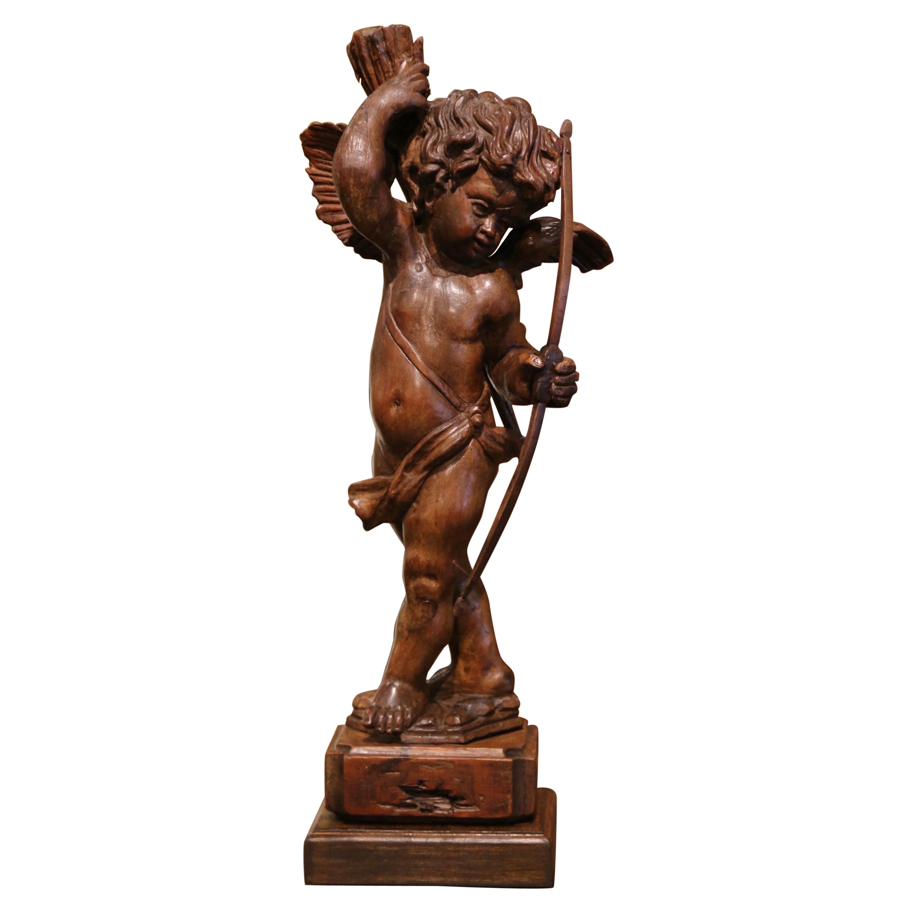 Mid-18th Century French Hand Carved Walnut Cherub Sculpture with Bow and Arrows
