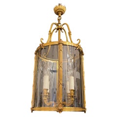 Fine Pair Bronze Readed X-Pattern Curved Glass Lantern Neoclassical Bow Fixtures