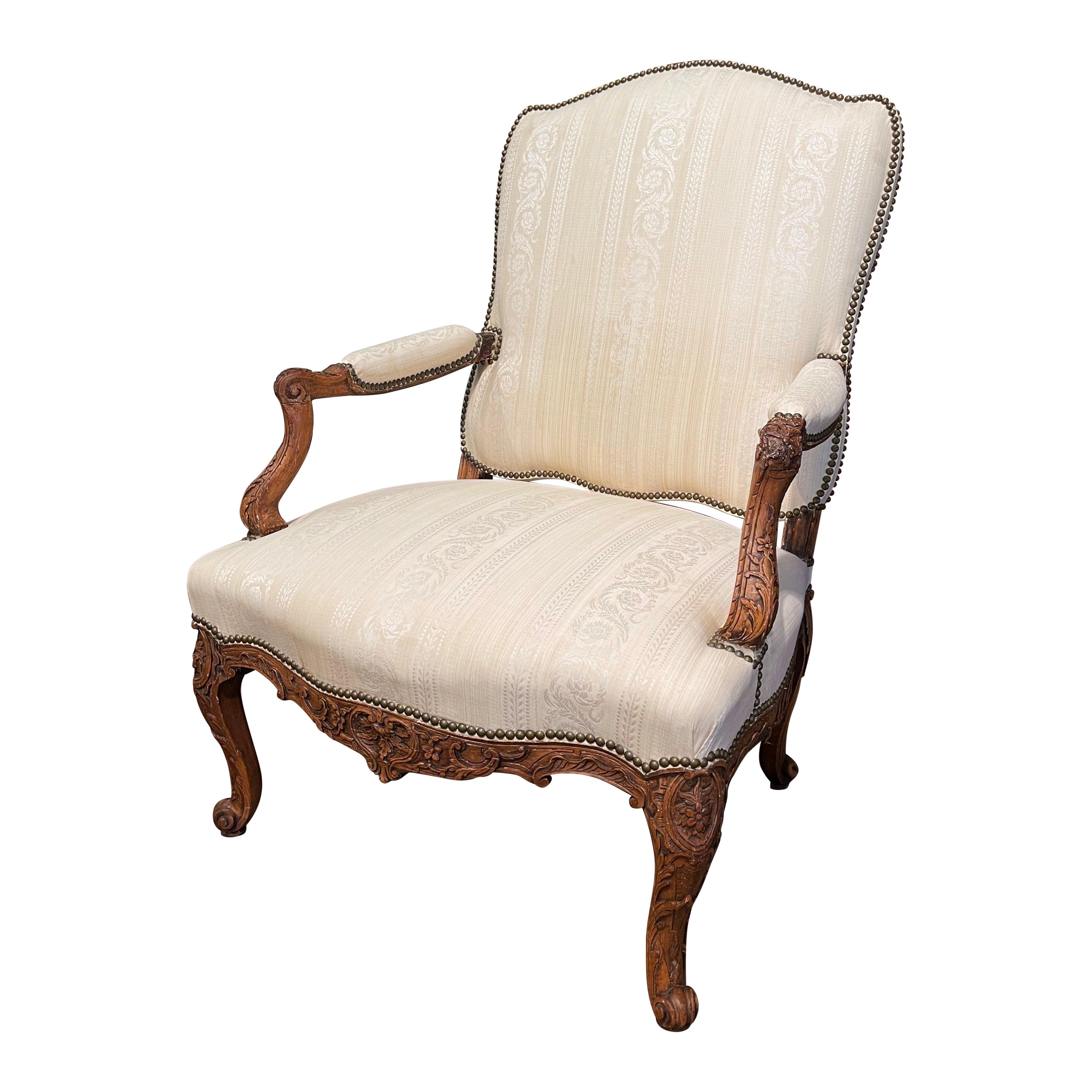 Mid-19th Century Louis XV Carved Walnut Upholstered Armchair from Provence For Sale