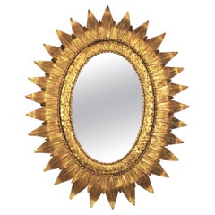 Sunburst Oval Mirror in Gilt Metal with Double Leafed Frame, France, 1950s 