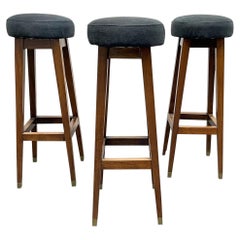 Three 1960s Walnut Bar Stools