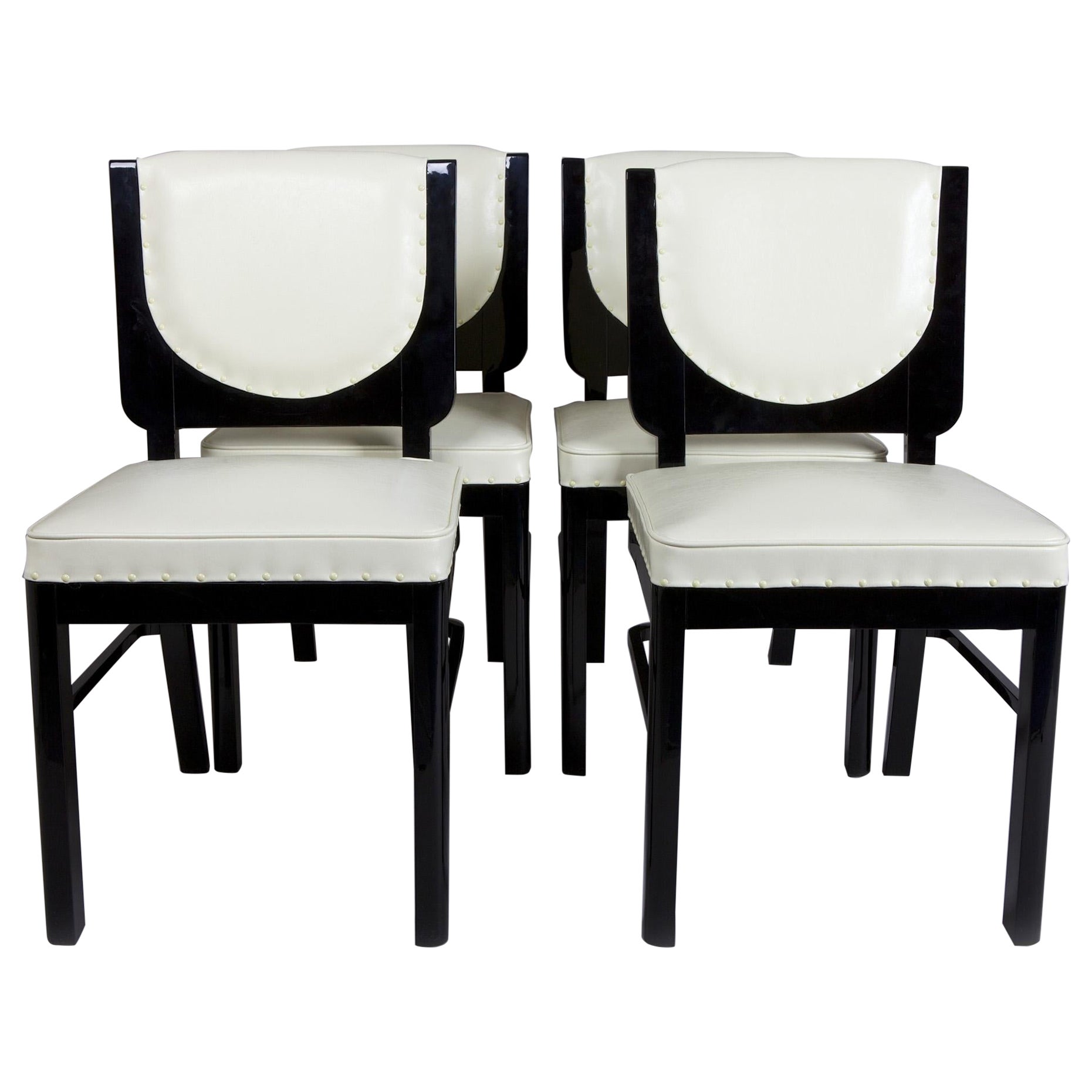 Ensemble de 4 chaises Art Déco françaises fabriquées dans les années 1920, entièrement restaurées, en ébène en vente