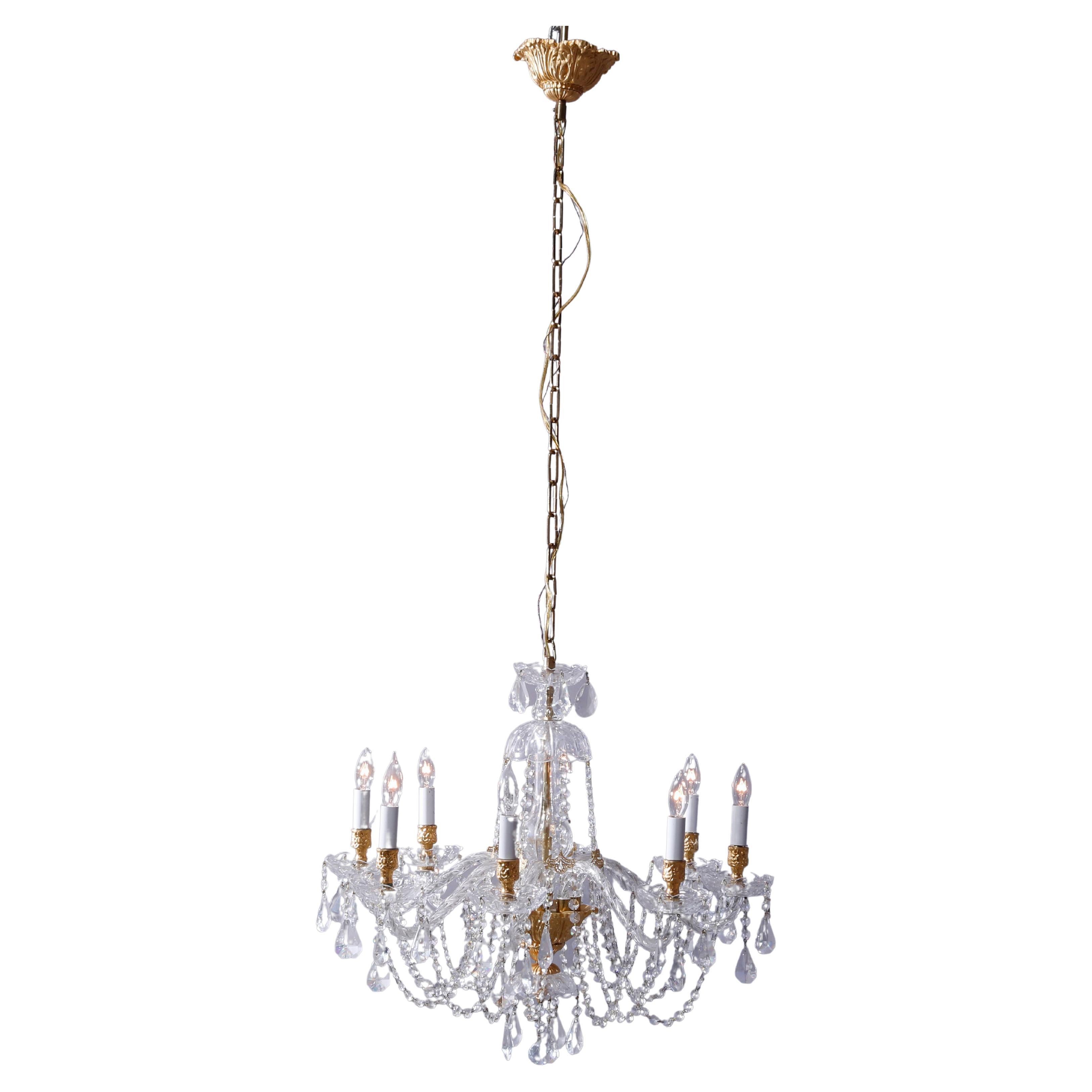 French Four-Arm Gilt Metal and Crystal Chandelier at 1stDibs