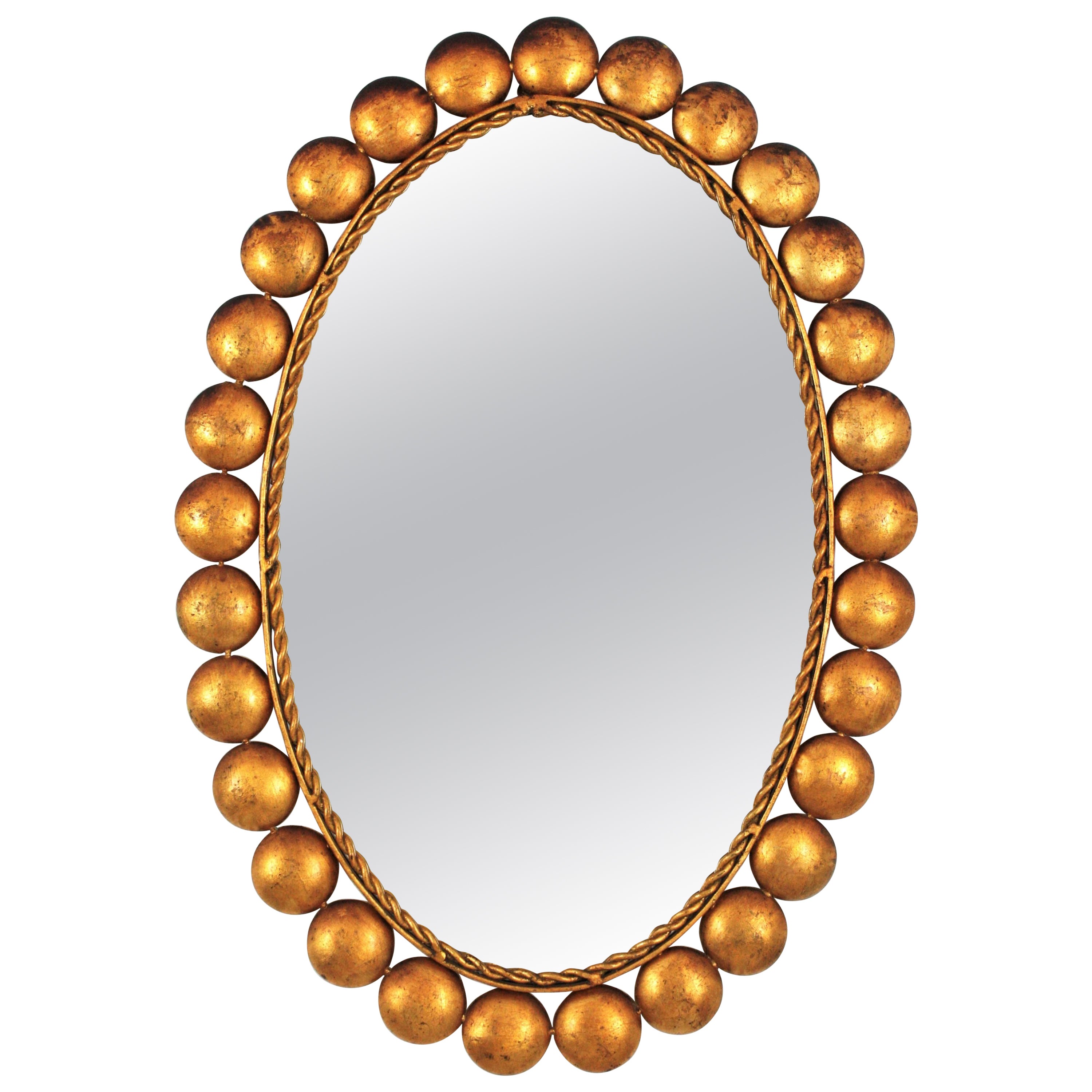 Miroir ovale avec cadre à boules, métal doré en vente