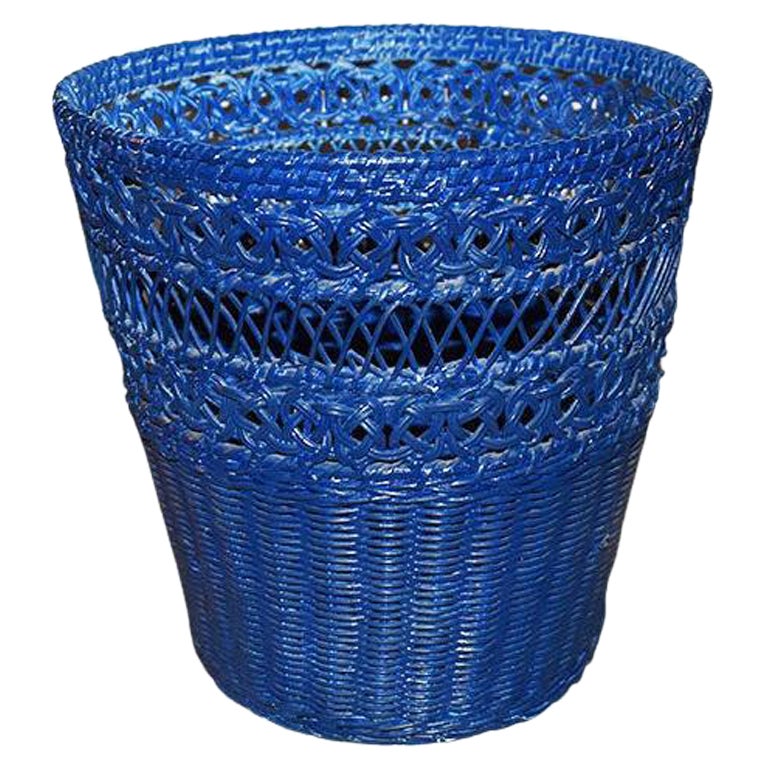 Bright Blue Circular Wicker Basket with Woven Floral Knot Pattern For Sale