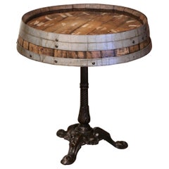 Early 20th Century French Polished Iron Pedestal Table with Oak Wine Barrel Top