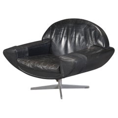 Johannes Andersen “Capri” Swivel Lounge Chair in Black Leather