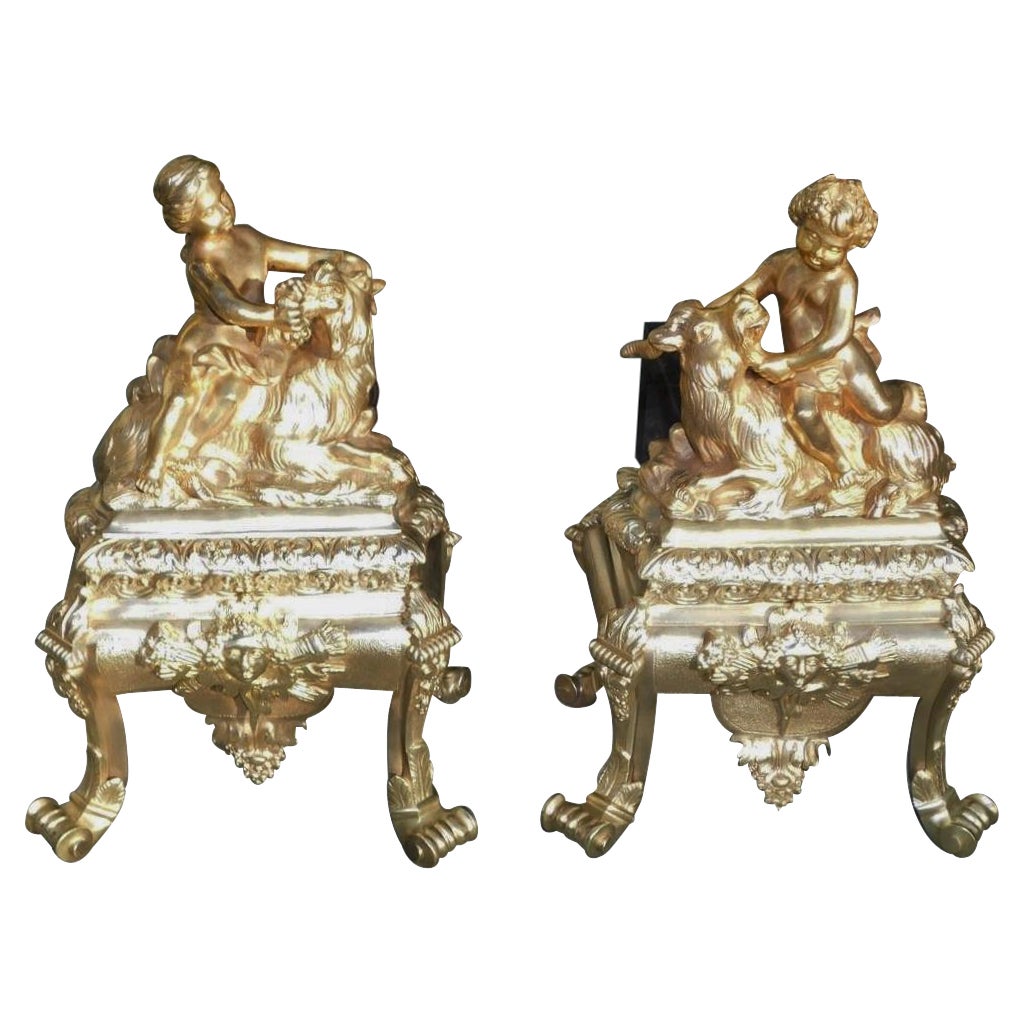 Pair of French Regency Gilt Bronze Figural Child & Goat Masked Andirons, C. 1725