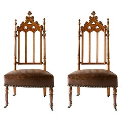 19th Century French Carved Oak Cathedral Style Chairs, a Pair