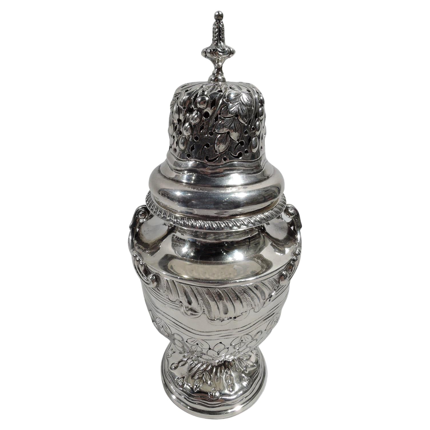 English Edwardian Classical sterling silver sugar caster, 1905. Ovoid bowl on ra