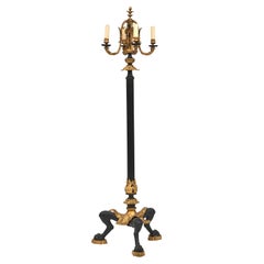 Lámpara de pie francesa de bronce dorado y pintado de negro, estilo Luis XVI