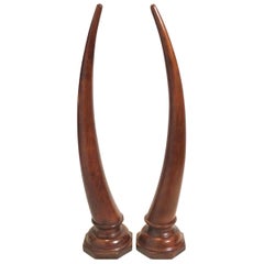 Pair of Large Carved Mahogany Tusks