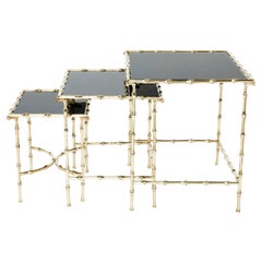 French Maison Baguès Bamboo Brass Black Top Nesting Tables 1960s
