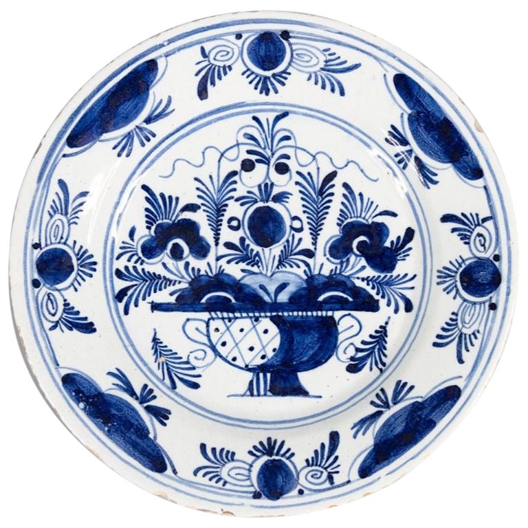 18th Century Dutch Delft Faience Floral Plate For Sale