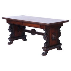 Antique Figural Carved Walnut Claw Foot Trestle Library Table, circa 1900