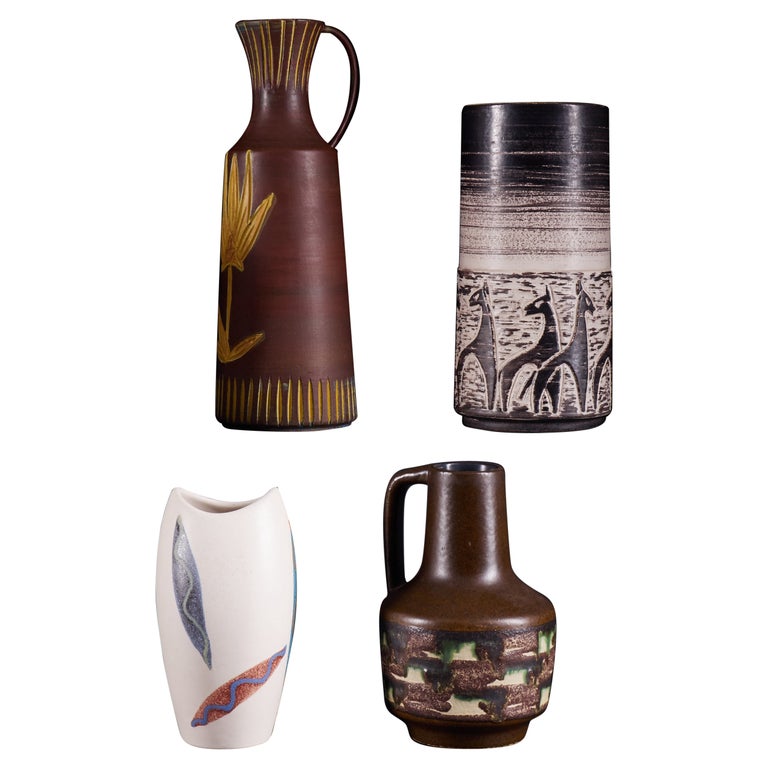 Set of Handmade Pitchers with Decorative Flower and Handle For Sale at