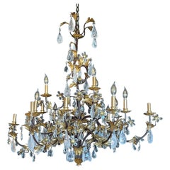 Kronleuchter aus Bergkristall im Stil Louis XV., Design aus Ebenholz und vergoldetem Metall