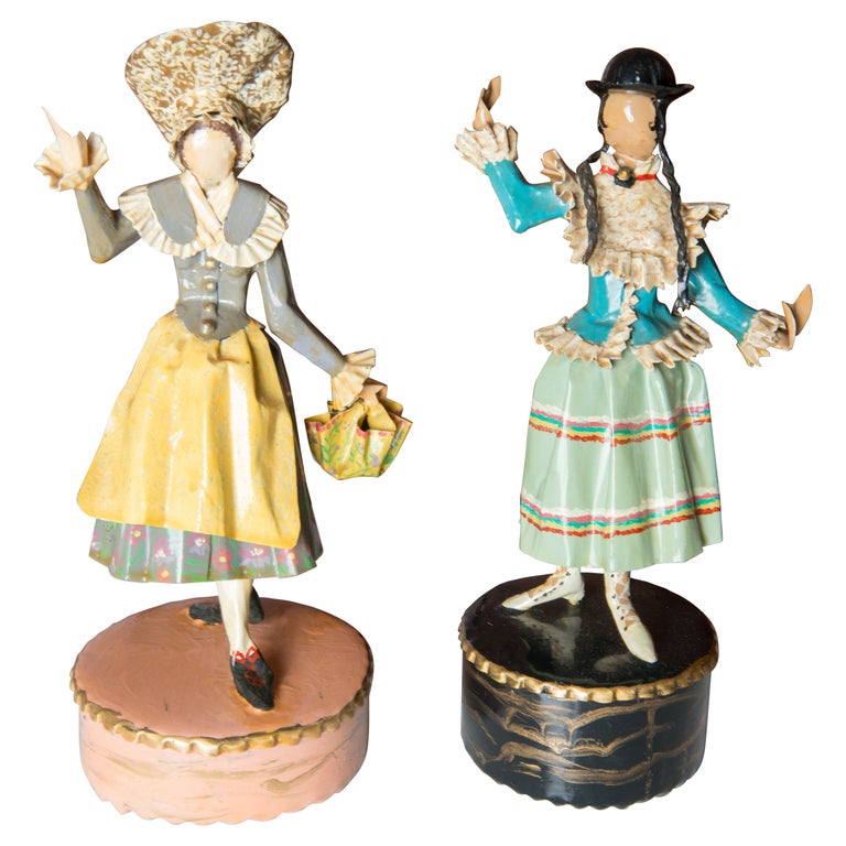 Pair of Figural Sculptures in Traditional Austrian Costumes by Lee Menichetti For Sale