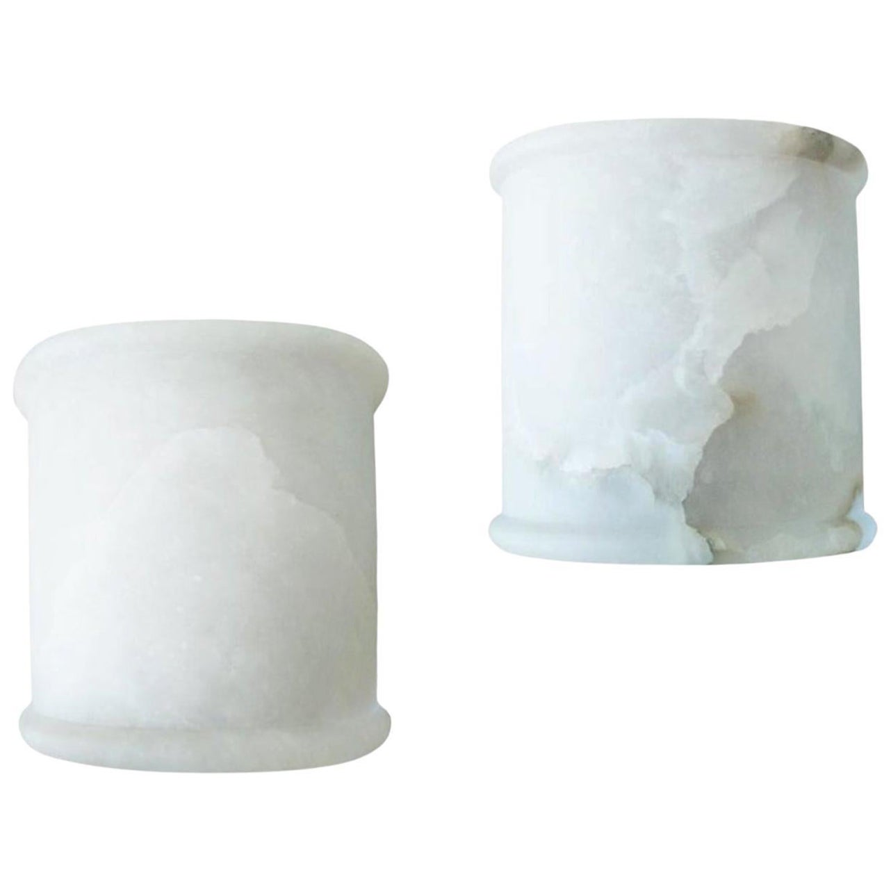 
Pair of Alabaster wall sconces, white with half cylinder shape.
 Minimalist , Art Deco
Natural alabaster sconces or wall lamps in the shape of a half cylinder in white with the typical gray vein of white Mediterranean alabaster
 It has a hanging