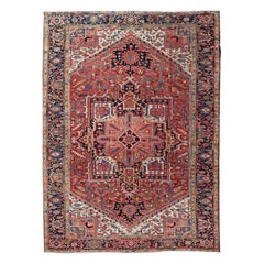 Antique Persian Heriz with Central Medallion Design in Red and Jewel Tones