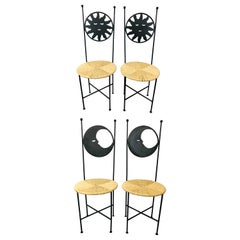 Used Art Deco French Wrought Iron Moon and Sun Rattan Seat Chairs, a Set of Four