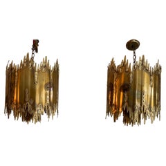 Pair of Tom Greene Brass Chandeliers by Feldman