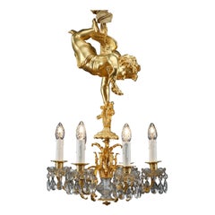 Gilded Bronze and Crystal Chandelier Held by a Putto