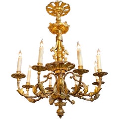 Lustre autrichien du 19ème siècle à 8 feux en bois sculpté et doré