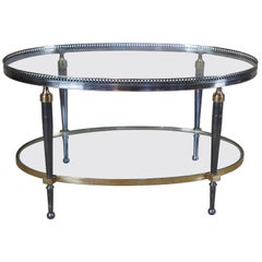 Table basse ovale Trouvailles Hollywood Regency en argent et laiton avec plateau en verre