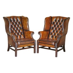Rare Pair of Antique Chesterfield Tufted Cigar Brown Leather Wingback Armchairs