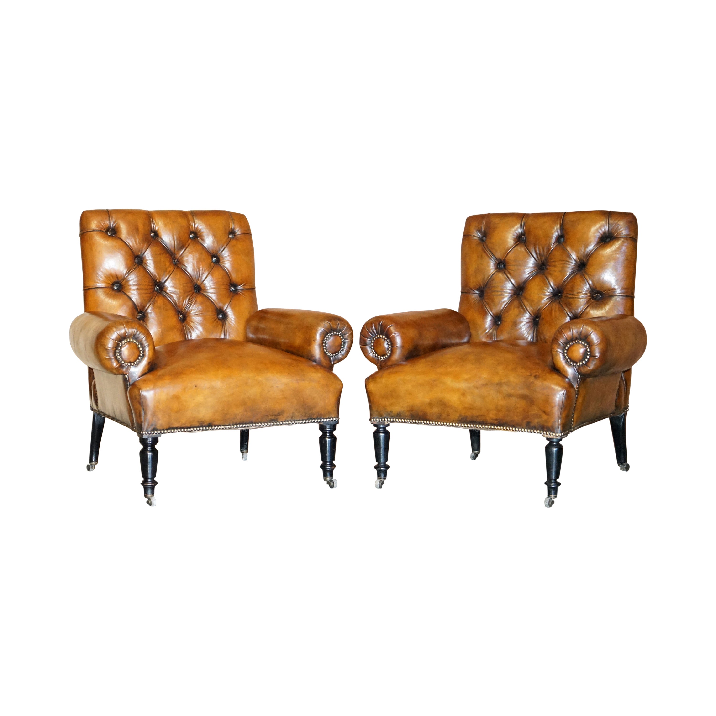 Restored Pair of Antique Regency Bolster Arm Brown Leather Library Armchairs For Sale