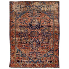 Antiker, handgefertigter, antiker Heriz-Teppich aus rostfarbener Wolle mit Medaillonmotiv