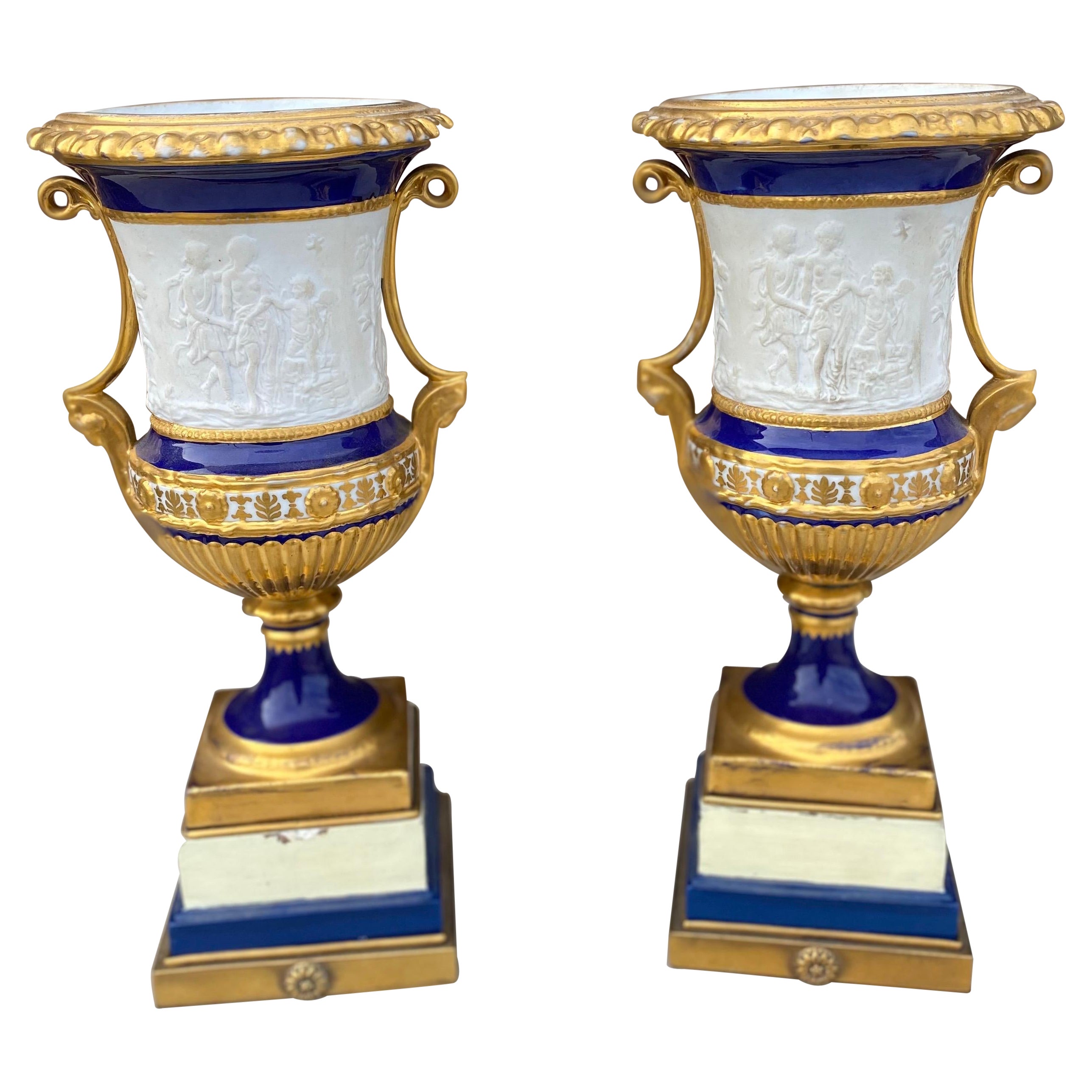 Pair of 19th Century French Porcelain Urns with Neoclassical Scenes For Sale