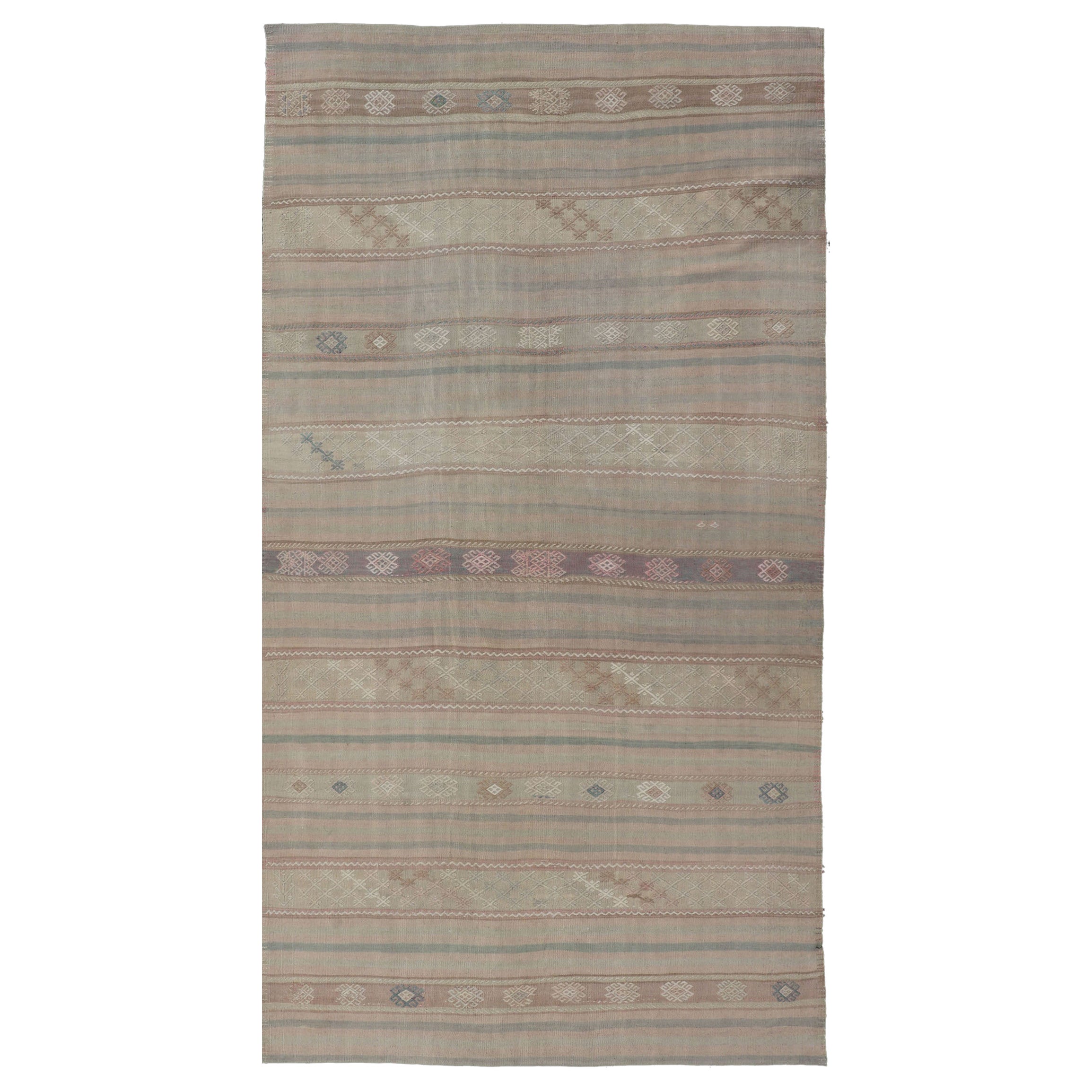 Flat-Weave Turkish Kilim with Embroideries in Earthy Tones and Hints of Pink For Sale