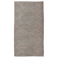 Tapis turc vintage brodé à tissage plat avec motif géométrique