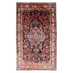 Tapis persan antique Nahavand à motifs tribaux sub-géométriques sur toute sa surface