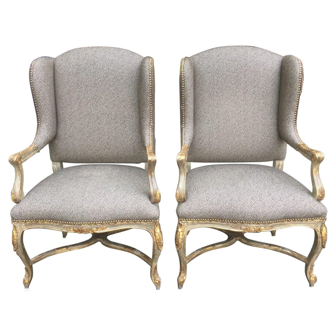 Glam Pair of Silver Painted French Wingback Chairs with Cheetah Upholstery