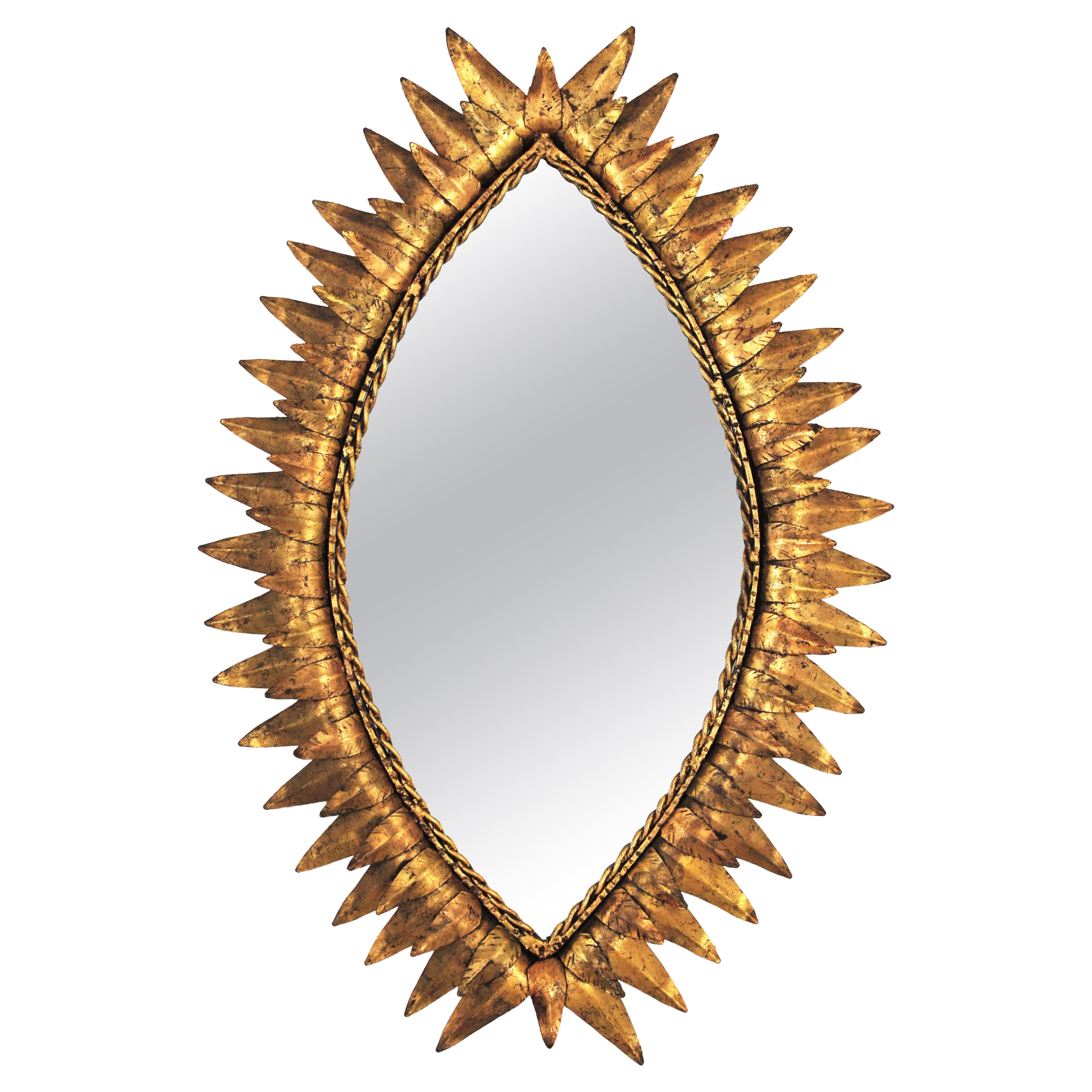 Ovaler Spiegel in Augenform mit Sonnenschliff aus vergoldetem Eisen im Angebot