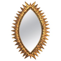 Sunburst Oval Eye Shaped Mirror in Gilt Iron